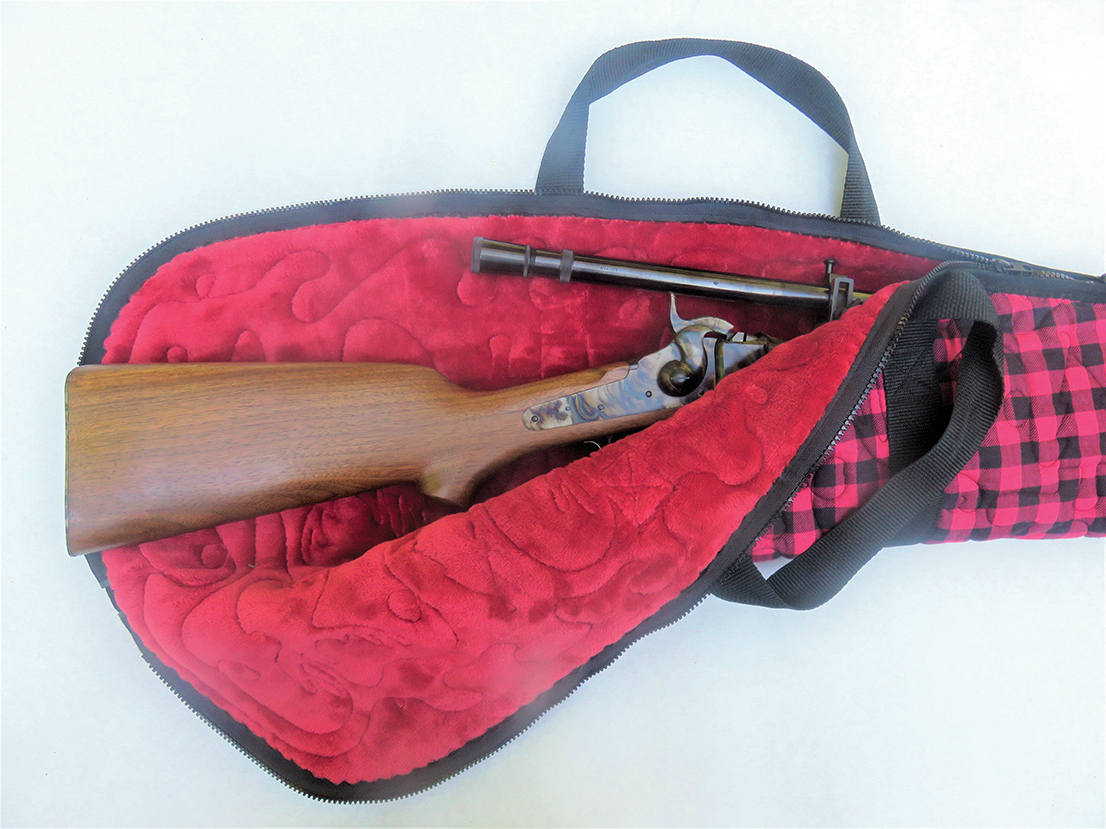 McDowall rifle case opened to show the red lining.